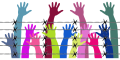 First public POPI investigation in SA - image of coloured hands behind barbed wire