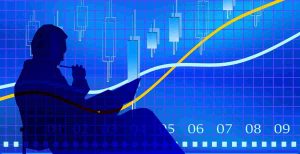 Thoughts about productivity and measures. Silhouette of a man thinking with a graph in the background.