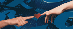 Programmers and romance - imagae of two hands touching a heart against a background of code.