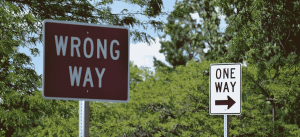 Wrong way sign post